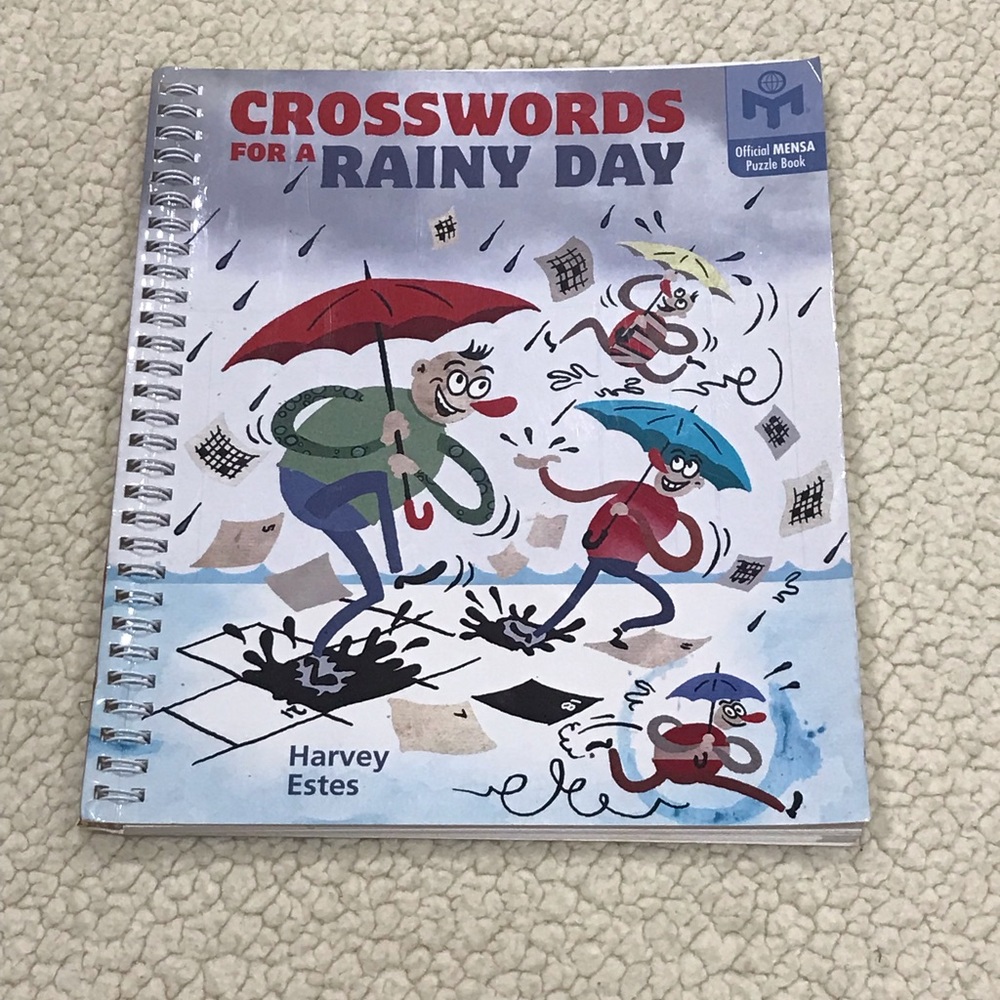 Crosswords for a Rainy Day NWOT
Official MENSA Puzzle Book
Spiral Ring Binder